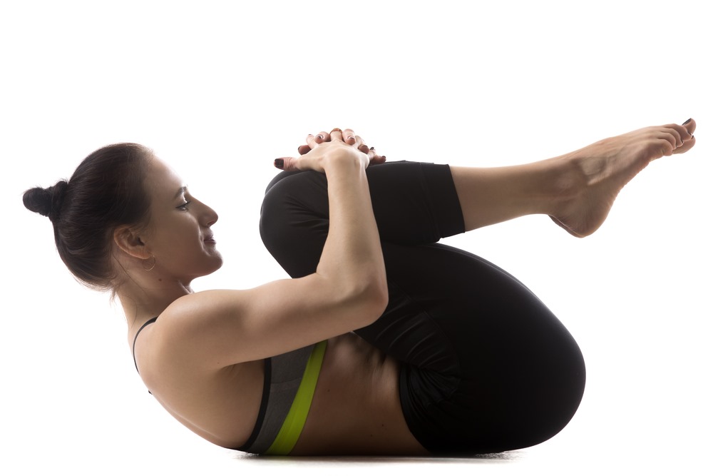 3 Bloat-Busting Yoga Poses to Practice This Holiday Season :: Heart and  Core Yoga Studio